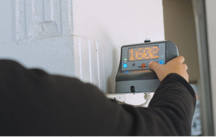 This picture shows a HygieneStation display mounted on the barn wall.