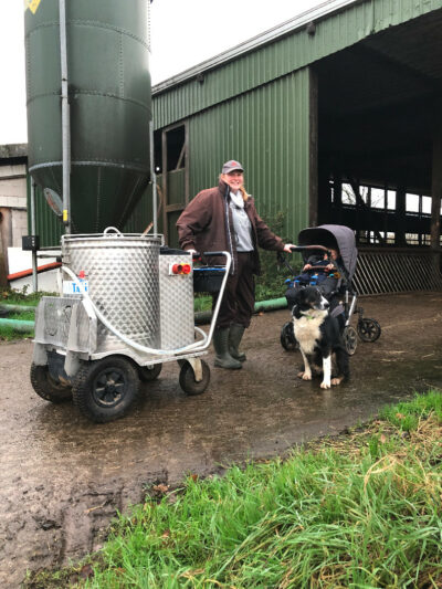 Freya Pferdmenges-Dethlefs on her way to the calves with pram and MilkTaxi