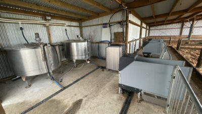 Two full milk tanks and the CalfExpert with 4 HygieneStations